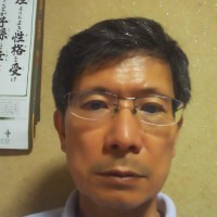 峯万里男