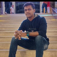 Dinesh M