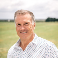 Laurie Cogger , FCA , CFP , FTIA , BBus , FAICD