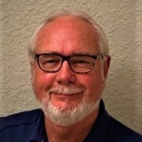 John K. Evans MHA, LFACHE