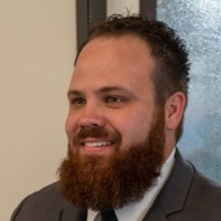 Kyle E. Crews