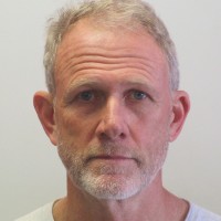 H.E. Sir Clive Poultney
