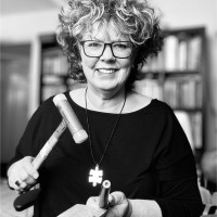 Corine B.