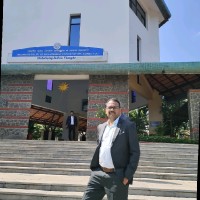 Upendra K B