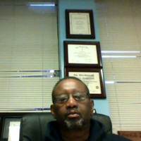 Dr. Alagie Khan