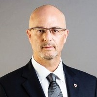 Dr. Gideon Fisher, Adv. and Arbitrator