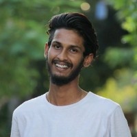 Dinesh M