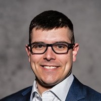 Adam J Trahan