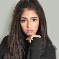 Nisha K