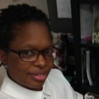 Tracy M Lewis