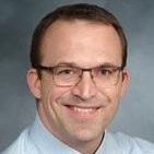 John E. Arbo, MD