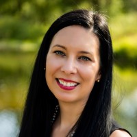 Erika Topola, Mba