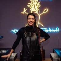 NADIN E.