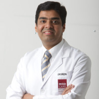 Dr Riza A V