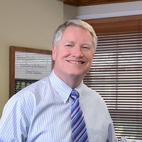 Dr. Mark L. Mangelson