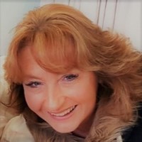 LOUISE SAXON