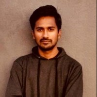 Dinesh M