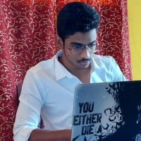 Tilak J