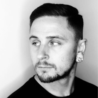 Nathan Waldvogel, MLS, E-RYT, YACEP (he/him)
