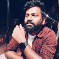 Prasad B