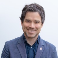 Andrew MacDougall, CHE