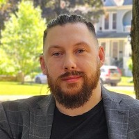 Adam J Badura, Assoc. Aia