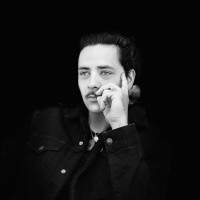 TOM BRU