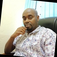 DR SIMON GITONGA
