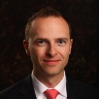 Adam E.