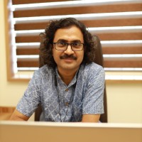 Shaji E