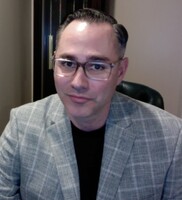 John B.