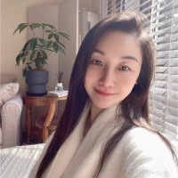 Xiaomei Song