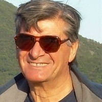 E. Roberto Martinez