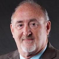 Norman Solomon,  JD