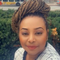 Murielle Mutatayi (Elle/She/Her)