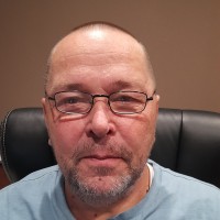 Russell D Melcher