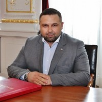 Dr. Tokhir T