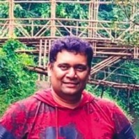 Charan B