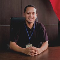 Dharmawan .