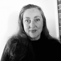 Justine Stratton, D.A.