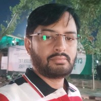 Dharmender M.