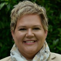 Dr.  Amy Torrens-Harry