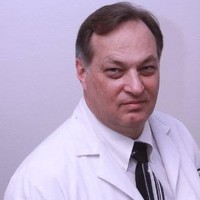 Dr. Thomas M. Hallisey