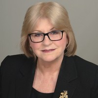 Jacquie Acheson, Aas