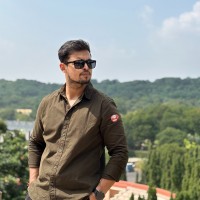 Naveen E.