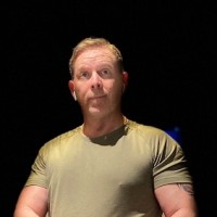 SIMON M.