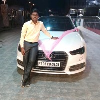 Madhan E