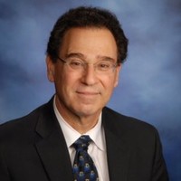 Robert M. Tomback, Ph.D.