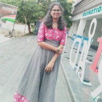 Monisha E