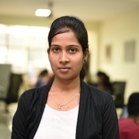 Asha T
